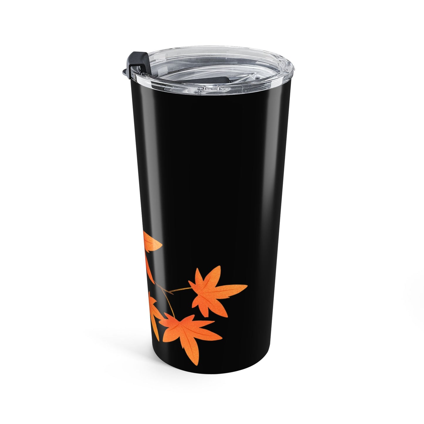 Black tumbler with orange floral designs on a white background