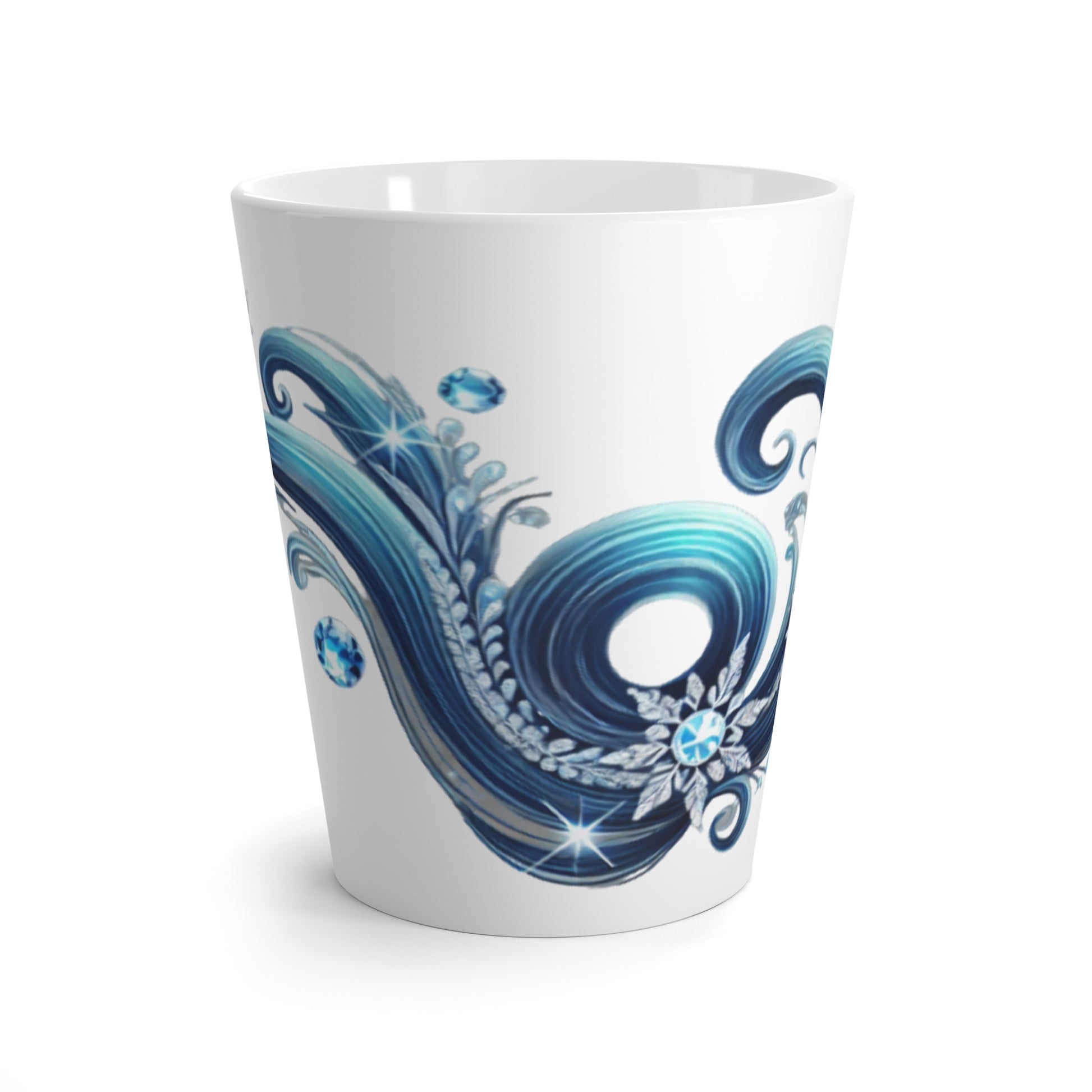 A white ceramic latte mug with a blue and crystal design featuring ocean waves and a floral element, placed on a table with  white background.