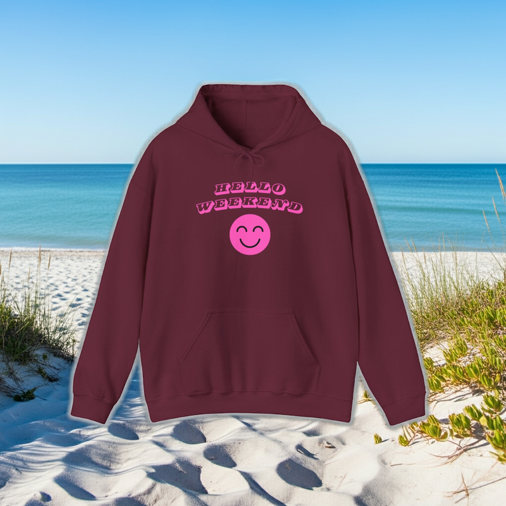 Maroon hoodie with pink text and smiley face on a beach