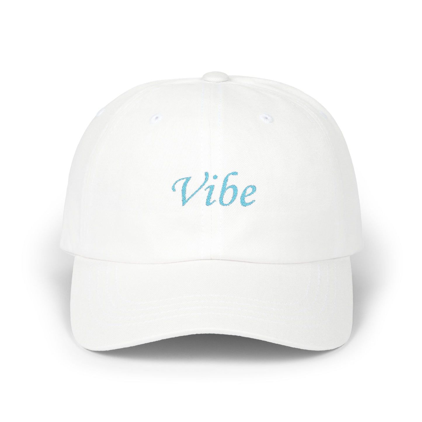 This is a baseball cap in white color with the word Vibe on it. 