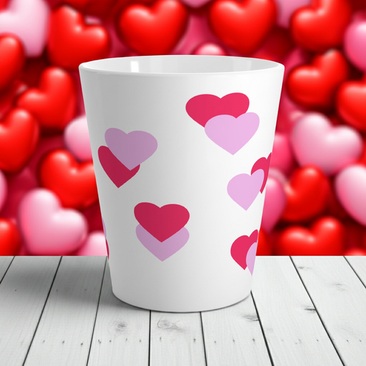 Synced Hearts Latte Mug – romantic ceramic coffee cup with overlapping candy hearts